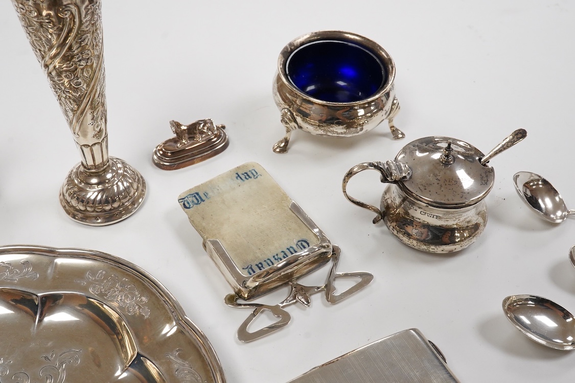 An early Victorian engraved silver plate, of cusped form, by Riley & Storer, London, 1844, with later engraved inscription, 17.5cm, together with two later silver cigarette cases, three silver condiments, a late Victoria